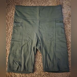 Universal Standard next to naked bike shorts ivy green